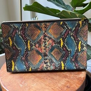 Stella McCartney snake print clutch 🌙